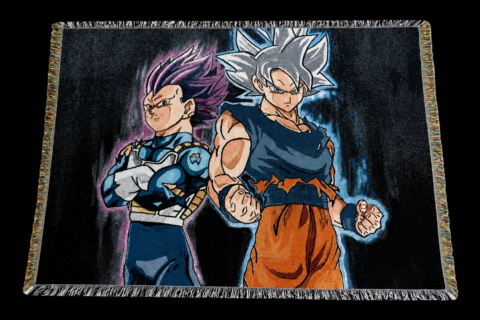 A rectangular woven throw blanket with fringe on all sides, featuring anime characters Vegeta and Goku from Dragon Ball Z on a dark background.